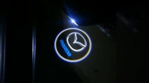Штатная подсветка двери с логотипом Mazda