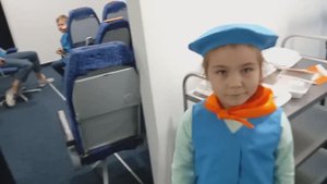Город профессий . Вика работает стюардессой .