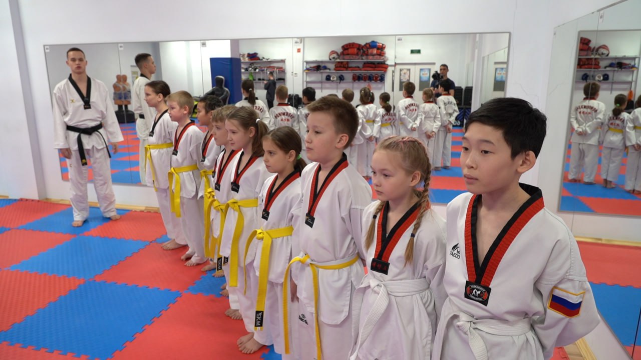 На спорте. Зарядка с чемпионом