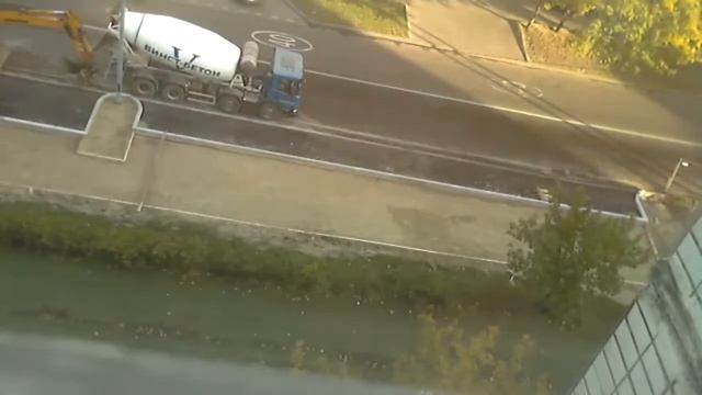 Укладка асфальта. Съёмка уличных работ по укладке асфальта.