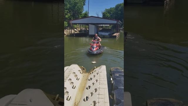 Logan on seadoo with daddy