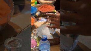 Man makes art using sand and a glass bowl Ferrari land Dubai