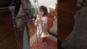 Cute 3 year old playing Trombone 1st time.