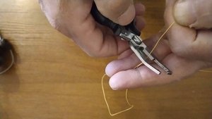 Как привязать леску к катушке. Простой рыболовный  узел.