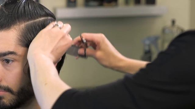 Classic men's medium length haircut with shear & clipper