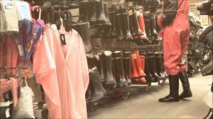 visiting a supermarket in rubber and rainwear