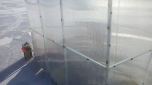 Домик для рыбалки зимой.