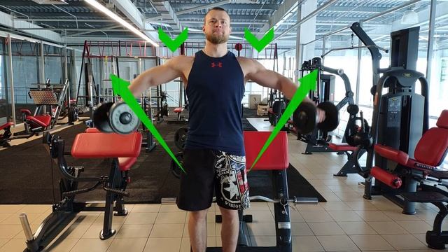 Махи гантелями стоя. Махи гантелями в стороны. Техника выполнения смотреть онлайн