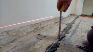 Выставление маяков для тонкого слоя заливки стяжки