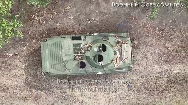 Уничтожение украинской БРМ-1К при помощи дрона с нехитрым приспособлением для сброса гранаты Ф-1 смотреть онлайн