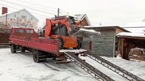 Аппарели для заезда минипогрузчика в кузов грузовика.