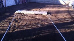 Выравнивание площадки под газон. Заодно и трамбовка