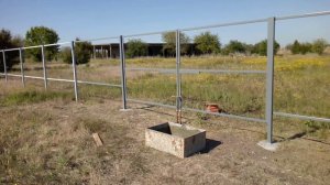 Мы сделали каркас забора с распашными воротами .