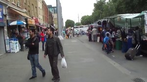 Walking along Whitechapel Road Street Market, London, UK; Tuesday 21st August 2012