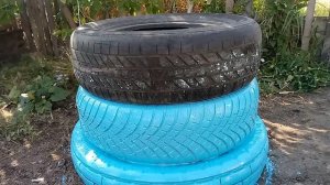 * Клумба из старых автомобильных покрышек.*