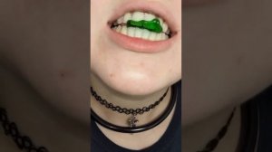 Girl swallows gummy bear beautiful mouth vore