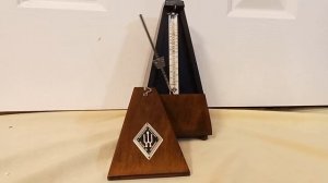 Restored Vintage West German Wittner Maelzel Bell Metronome in walnut wood to purchase.