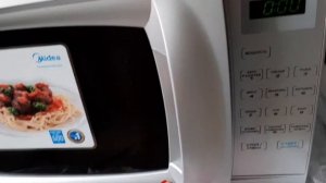 Распаковка - Микроволновая печь Midea EM720CKL-S