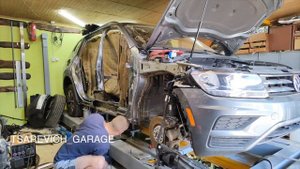 Volkswagen Tiguan боковой удар, замена средней стойки. Стапель как в Каховке.