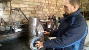 Дымосос, вытяжной вентилятор для твердотопливного котла параллельного действия.