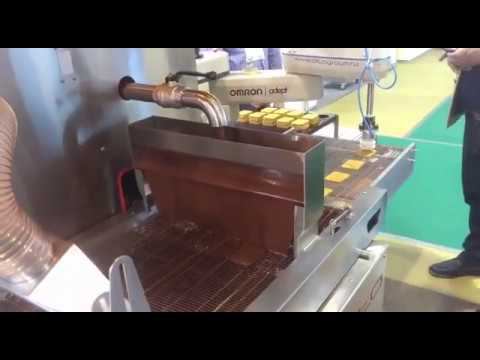 Автоматический укладчик кондитерских изделий