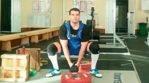 Приседания с весом между ног: техника выполнения
