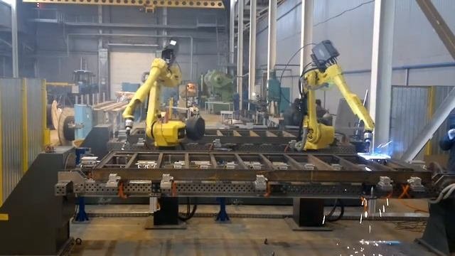 Роботизированный комплекс  сварки крупнощитовой  строительной опалубки  промышленными роботами Fanu