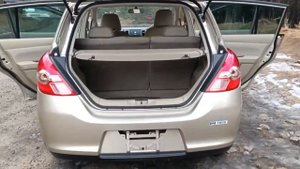 Обзор Nissan Tiida 1.5 Axis performance spec 2009 / Купить в Чите Nissan Tiida 2009