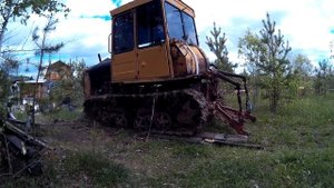 ДТ-75. Сливаем масляную эмульсию.