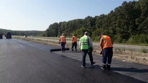 Укладка сетки для асфальта. Армирование асфальта.