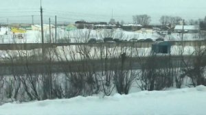 От Исакогорки до Архангельска из окна поезда зимой