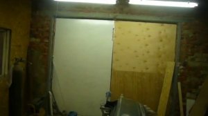 Утепление стен гаража ОСП плитами, ворот фанерой.