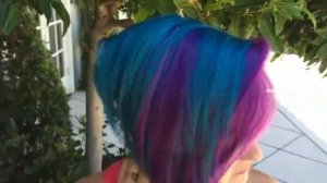 Laina in peacock green, purple & blue