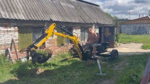 прицепной экскаватор