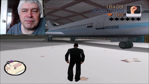 Геннадий Горин играет в игру, игра ГТА зимняя. Я теперь знаю где находится аэропорт в игре