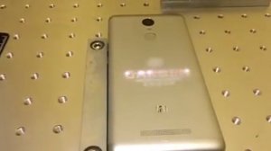 Гравировка телефона xiaomi redmi note 3 pro. Покупайте у нас станки. Лазерный маркер.