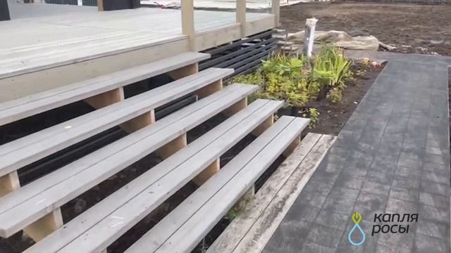 Благоустройство и озеленение: укладка тротуарной плитки и посадка растений
