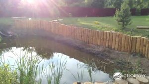 Укрепление берега бревном лиственницы