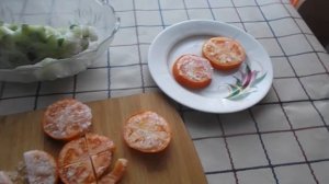 Салат из замороженных огурцов и помидоров.