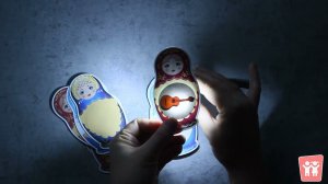 Игра с фонариком "Что спрятано в матрешке? Музыкальные инструменты"