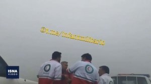 Прибытие спасательных отрядов к месту крушения вертолета президента Ирана. Виден сильный туман
