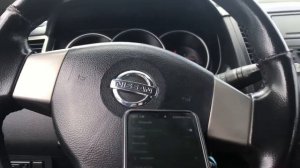Nissan tiida check engine light Spanish