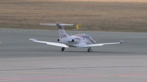 Channel Jet Eclipse 500 taxi and take off at airport Graz (GRZ) II 2-JSEG