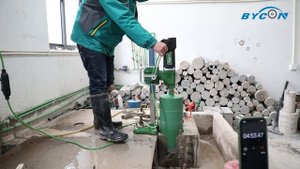 Тестовое алмазное бурение бесщеточным мотором DMP 252B. Диаметр 200 мм. Арматура трехрядная 32 мм