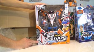 Огромная посылка с игрушками: Тоботы Трансформеры, КарБот и мини фигурки пилотов Тоботов.