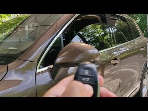 Опускание стекол VW Touareg USA на штатном ключе