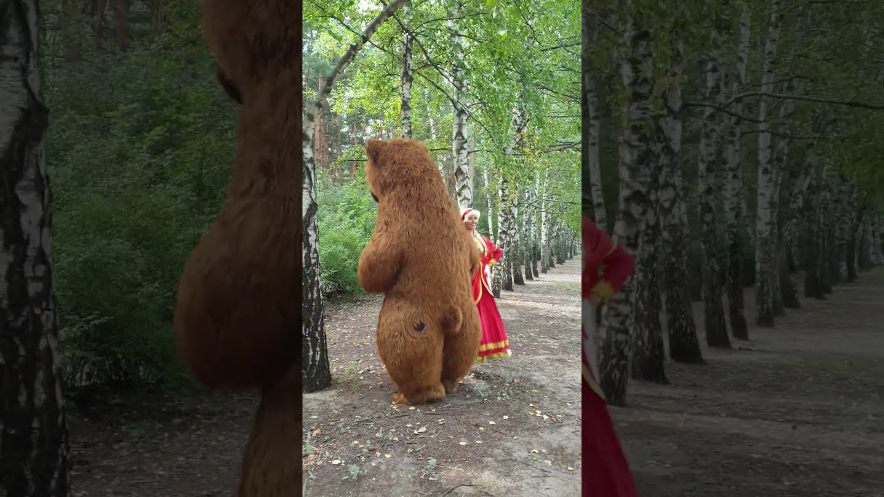 Красавица танцует с мишкой в лесу