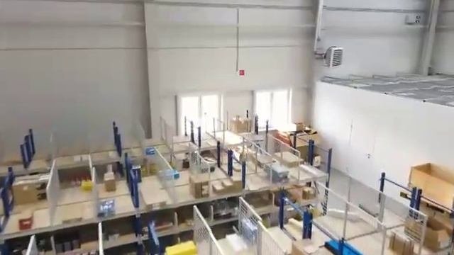 Склад с  паллетными стеллажами и двухэтажным мезонином