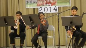 Saxophone, Trumpet and Violin trio playing to a song from Coldplay