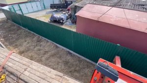 Гараж через забор манипулятором 7 тонн.